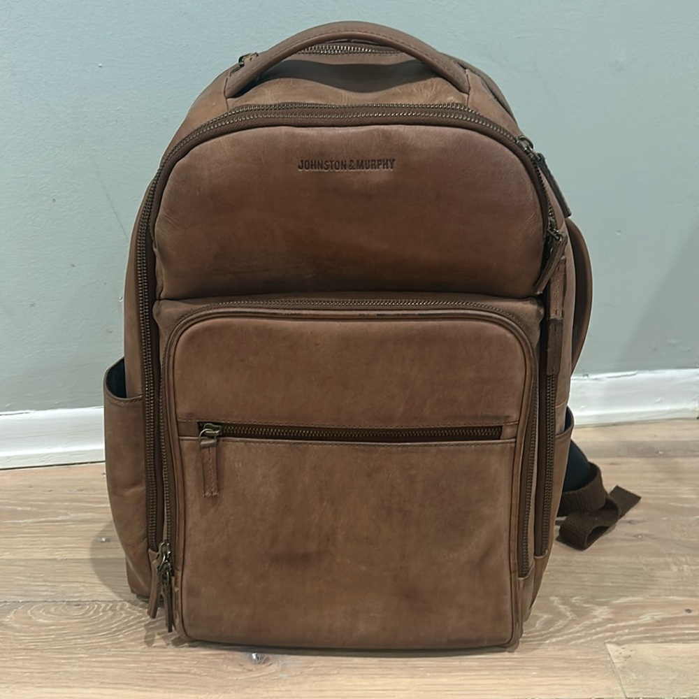Johnston & Murphy men’s brown leather backpack.